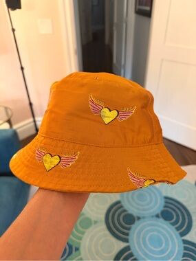 Lisou Orange Bucket Hat with Embroidered Winged Hearts